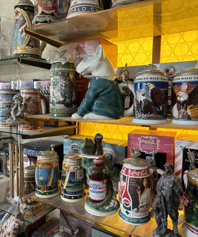 A room filled with lots of beer steins and other items.